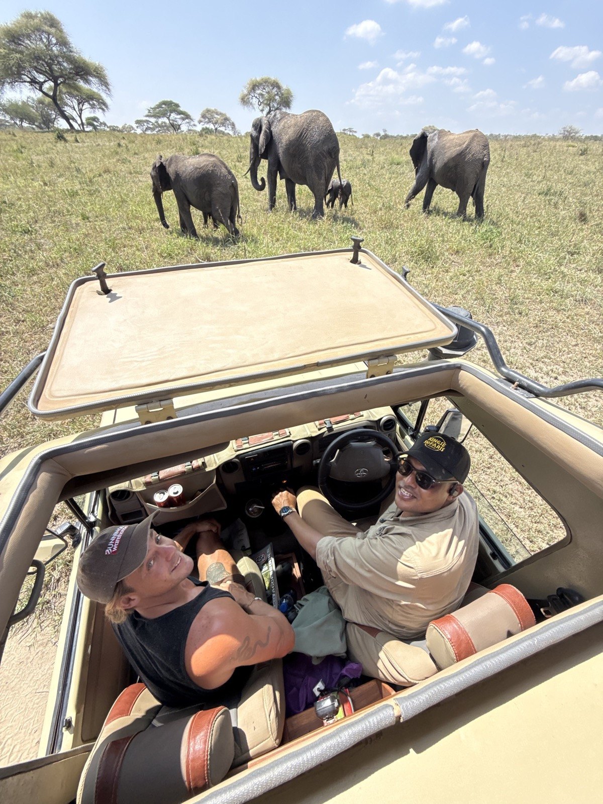Jackson Potter and Pete Nanyaro on safari in Tanzania