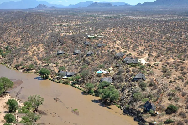 The Ewaso Nyiro River winding through the dry country of Samburu, seen from above