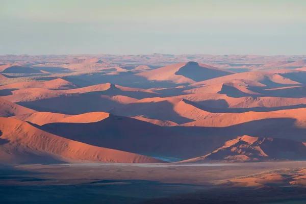 The dune sea near Sossusvlei from the air at first light, from Little Kulala's gallery