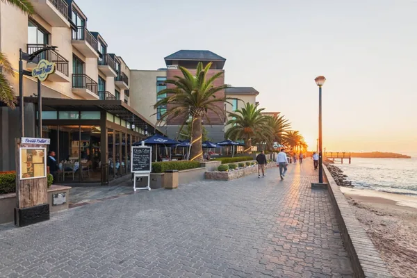 The seafront promenade at Swakopmund at sunset, beside the Strand Hotel