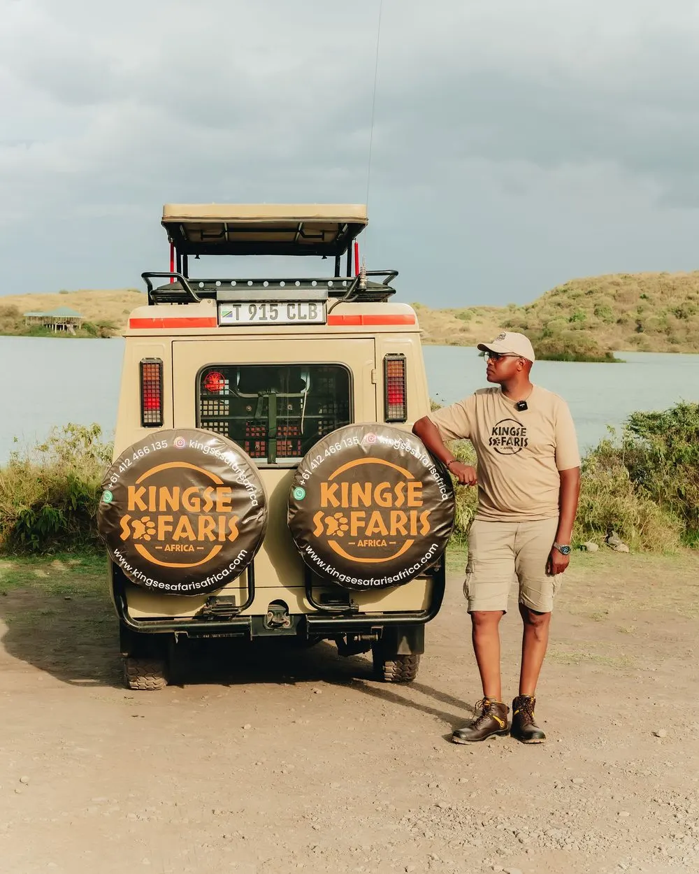Peter Nanyaro, co-founder and lead guide, beside the Kingse Safaris vehicle