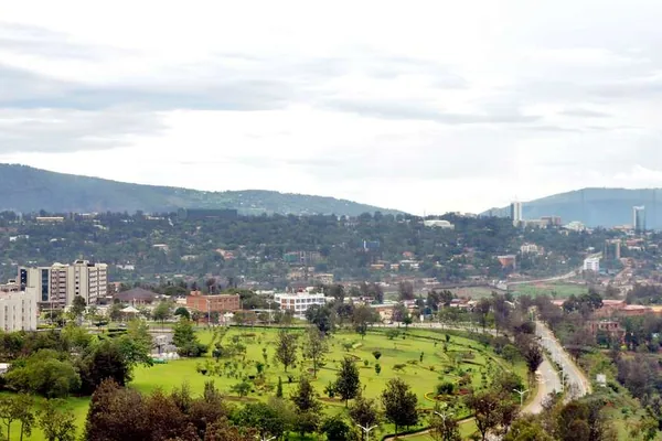 The Kigali skyline over a green valley