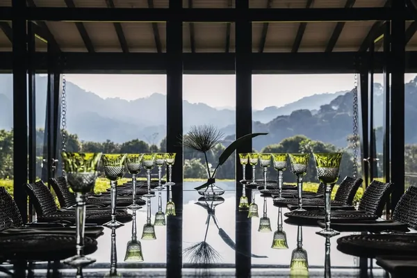 The dining room at One&amp;Only Nyungwe House looking out over the forested hills