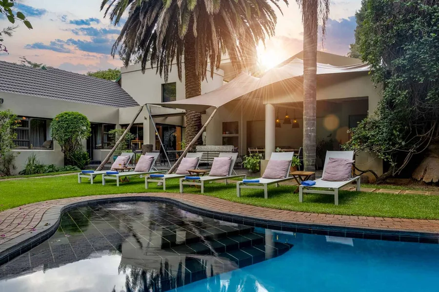 The pool and garden at African Rock Hotel, ten minutes from OR Tambo