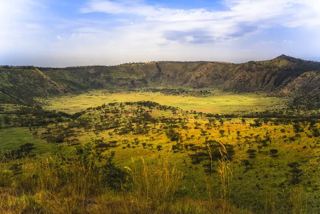 Savannah and crater landscape in Queen Elizabeth National Park, Uganda