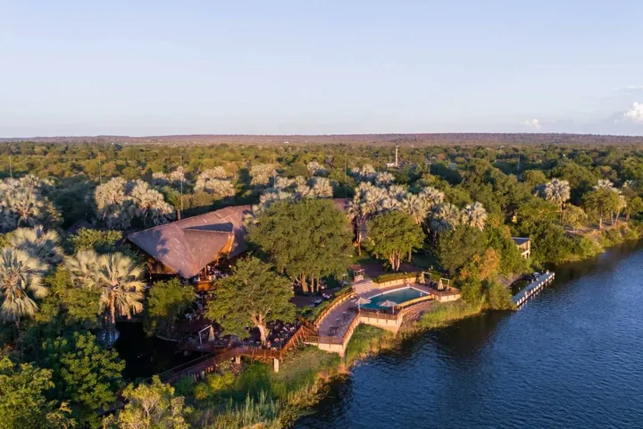 An aerial view of the lodge, its pool and the Zambezi at The David Livingstone Safari Lodge and Spa