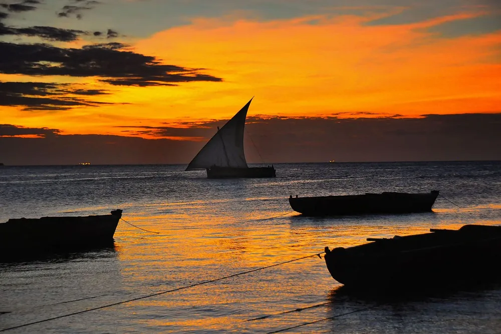 A dhow at sunset off Zanzibar